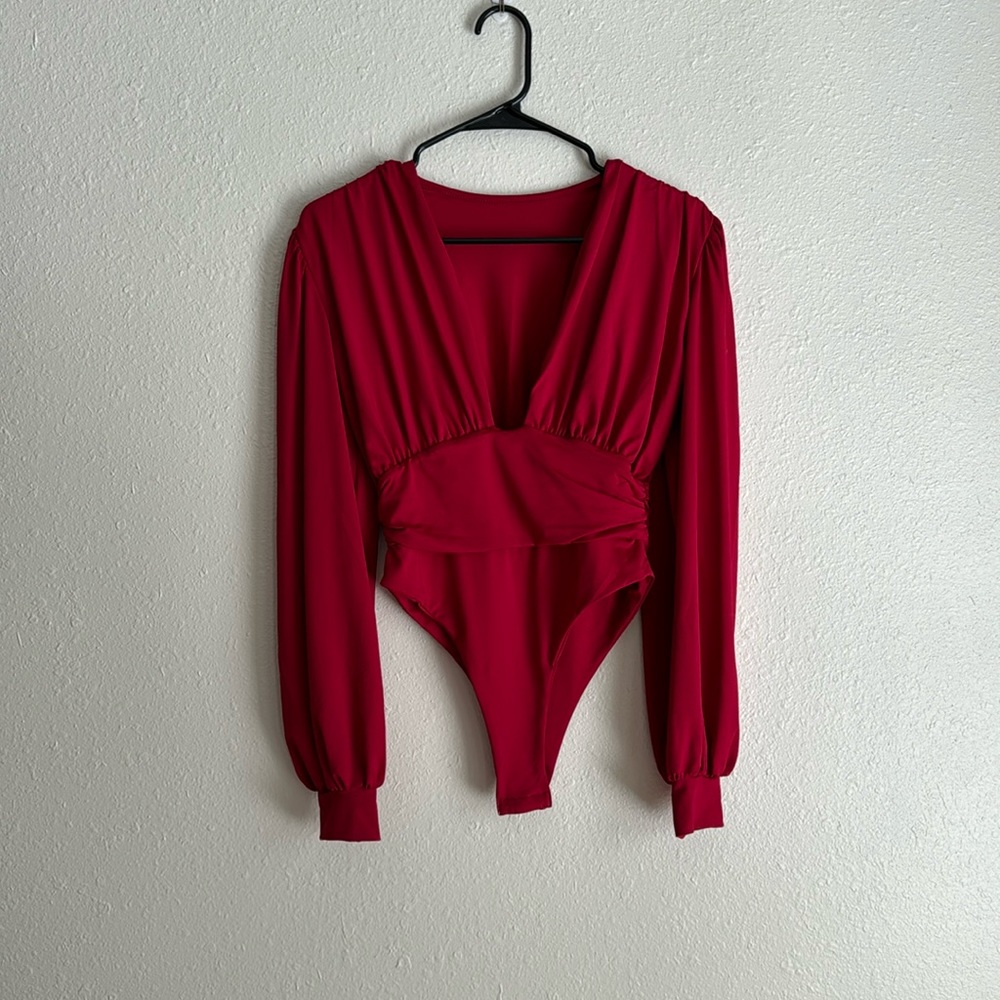 Red long sleeve body suit